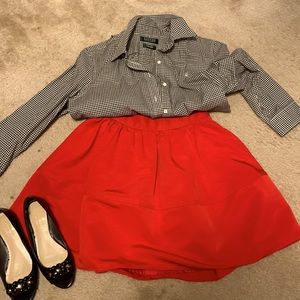 Express skirt, size 0. Cute for the holidays with a black or silver sweater.